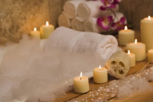 Parcstone Apartments in Fayetteville A luxurious bathtub filled with scented candles and soothing soap, creating a serene ambiance.