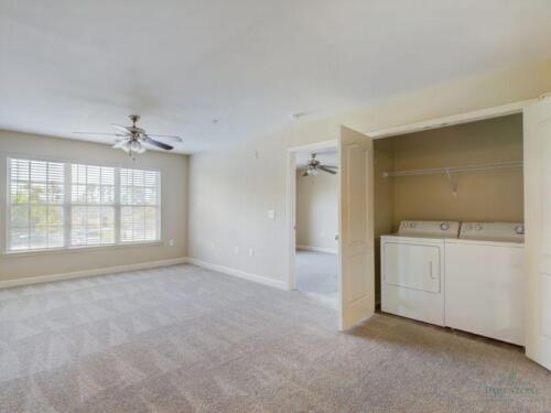 One-Bedroom-Apartments-in-Fayetteville-North Carolina-Living-Room-with-Washer-and-Dryer-Closet